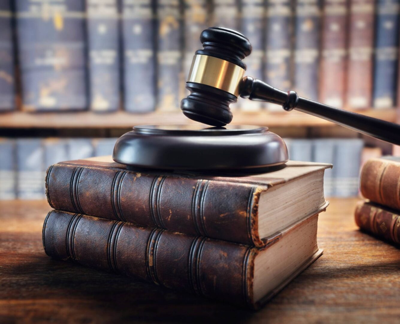 Judge's gavel and legal tomes