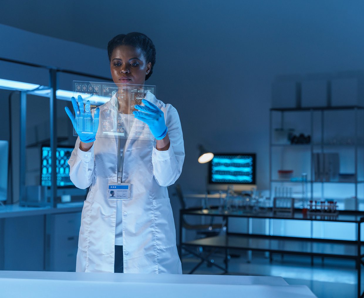Scientist examining samples in laboratory