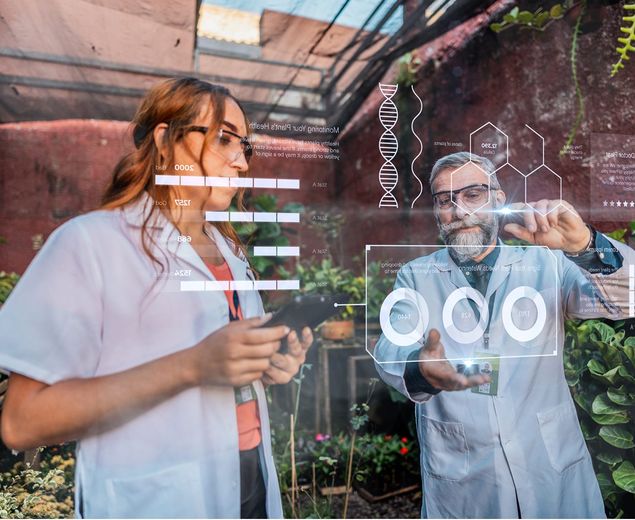 Scientists analyzing data on transparent screen